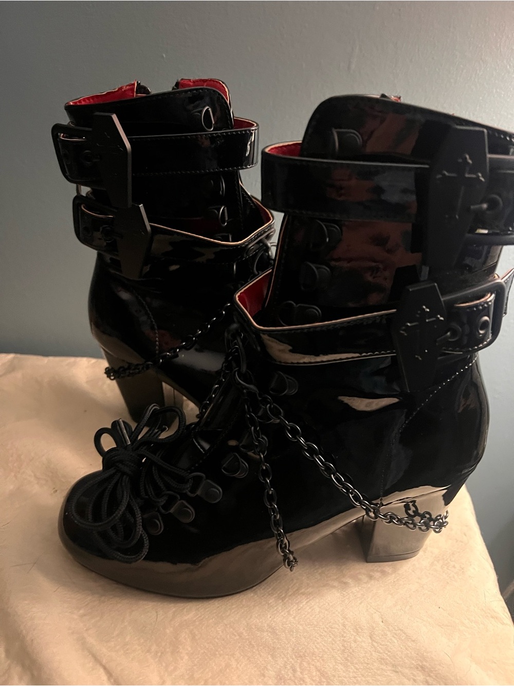 Demonia Women’s Black Patent Chain-Accent Ankle Boots